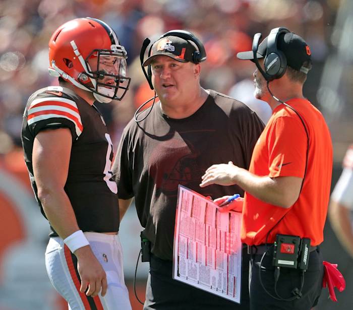 Cleveland Browns quarterback Baker Mayfield (6) meets with Cleveland Browns offensive coordinator Alex Van Pelt, center, and Cleveland Browns head coach Kevin Stefanski during the first half of an NFL football game against the Houston Texans, Sunday, Sept. 19, 2021, in Cleveland, Ohio. [Jeff Lange/Beacon Journal] Browns 10
